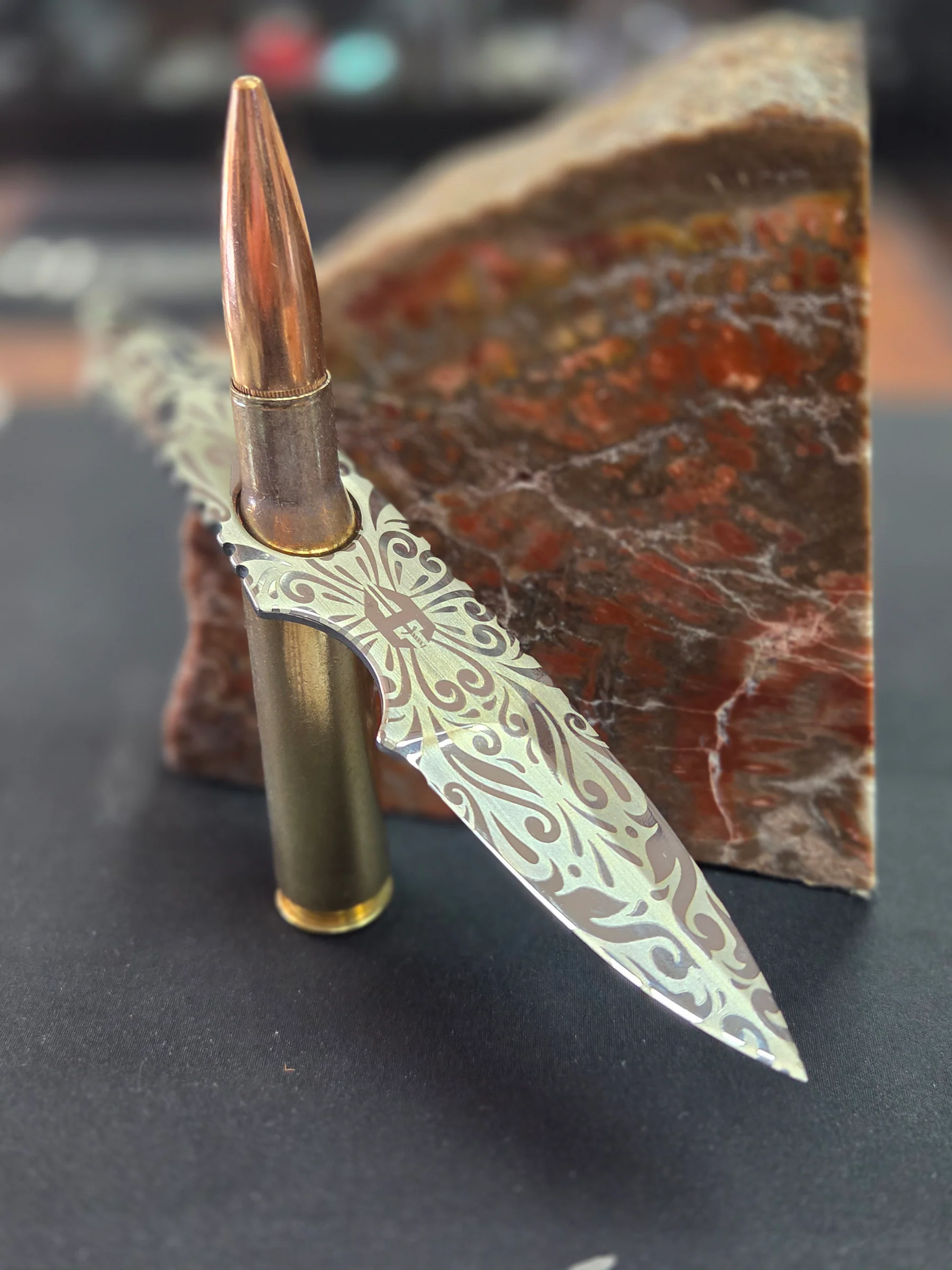 Ornate knife with a rifle-cartridge handle at Gun Boss in Bullhead City, Arizona